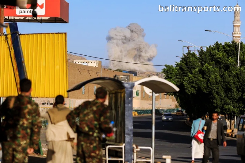 A plume of smoke rises during a reported airstrike by the Saudi-led coalition on the Houthi-controlled Yemeni capital Sanaa